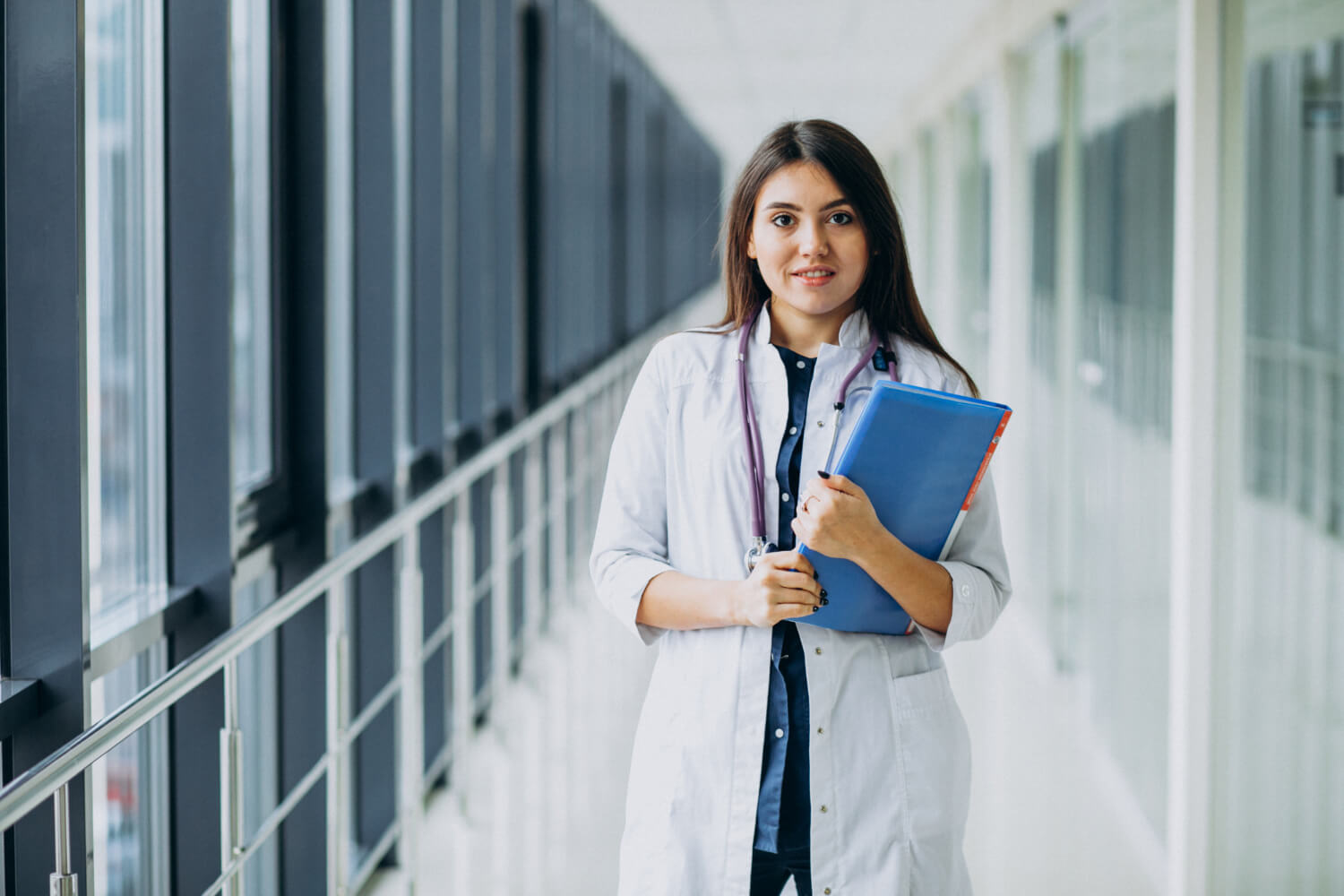 attractive-female-doctor-standing-with-documents-hospital (1)